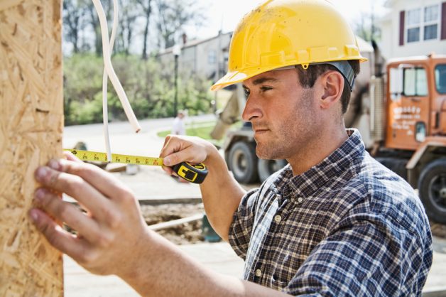 Construction workers at work site